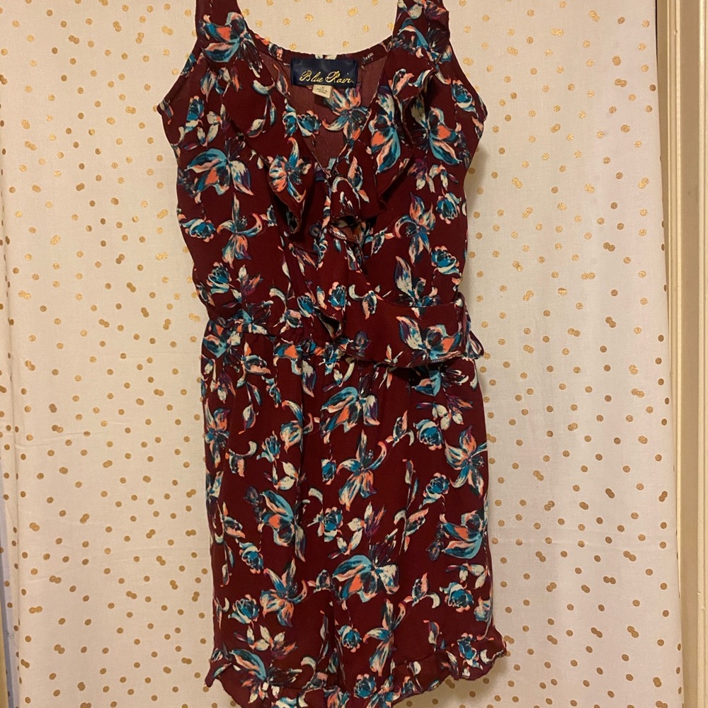 CUTE red romper with floral design.